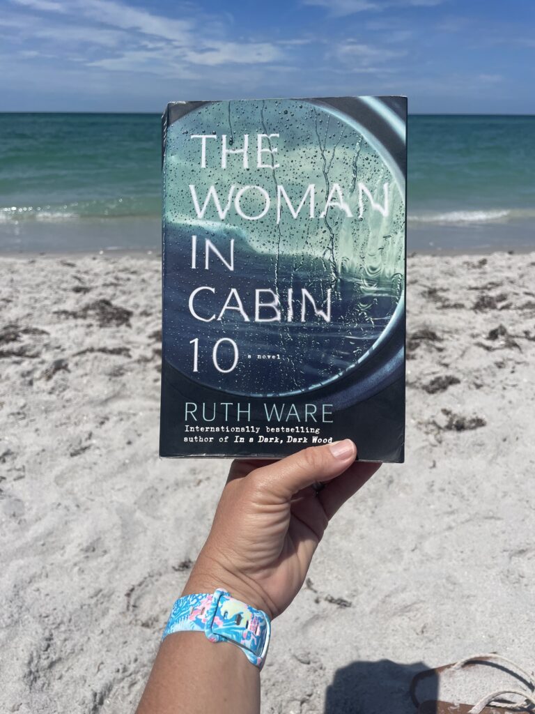 Copy of "The Woman in Cabin 10" on the beach.